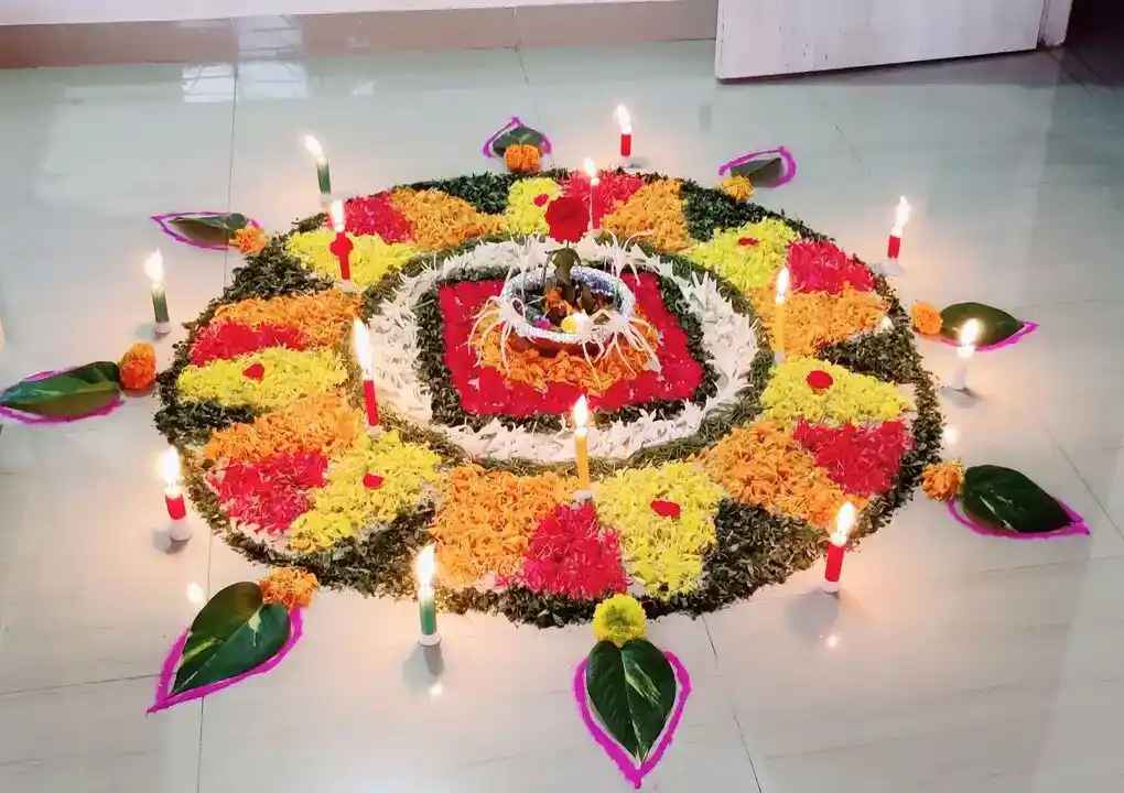 Marigold and wheat grain rangoli