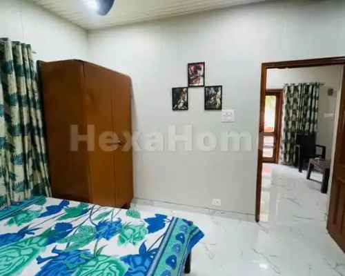 Manish  is sharing a room in 2BHK Flat carousel