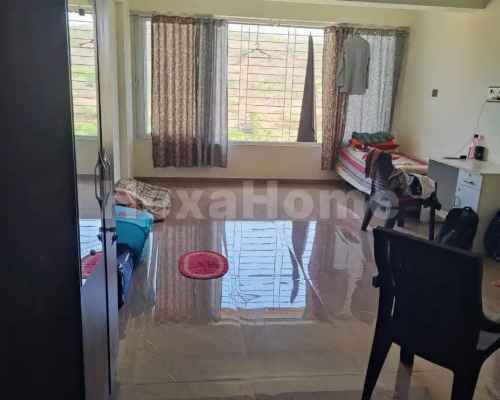 Sachin is sharing a room in 2BHK Flat carousel